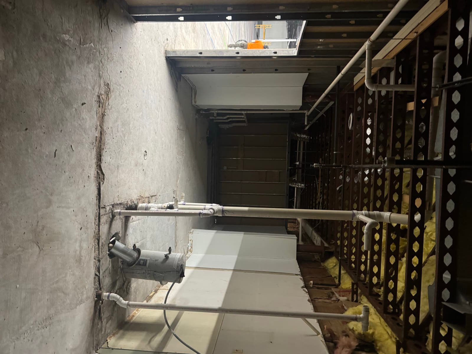 Interior demolition and mechanical rough-in on a commercial build